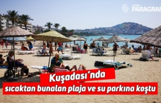 Kuşadası’nda sıcaktan bunalan plaja ve su parkına...