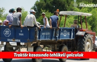 Traktör kasasında tehlikeli yolculuk