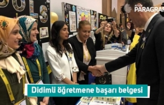 Didimli öğretmene başarı belgesi