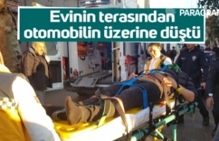 Evinin terasından otomobilin üzerine düştü