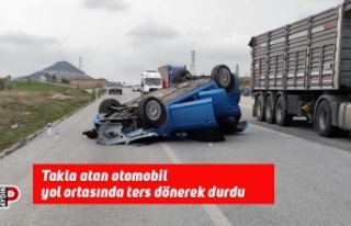 Takla atan otomobil yol ortasında ters dönerek durdu
