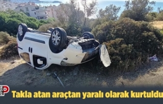 Takla atan araçtan yaralı olarak kurtuldu